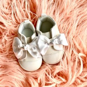 First Steps: White Baby Shoes